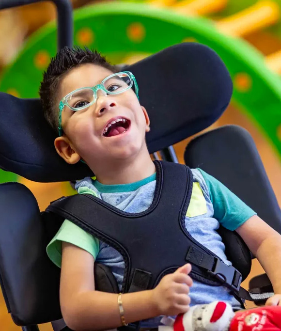 kid with blue glasses